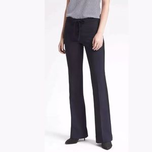 Olivia Palermo navy lace up flare stretch pants